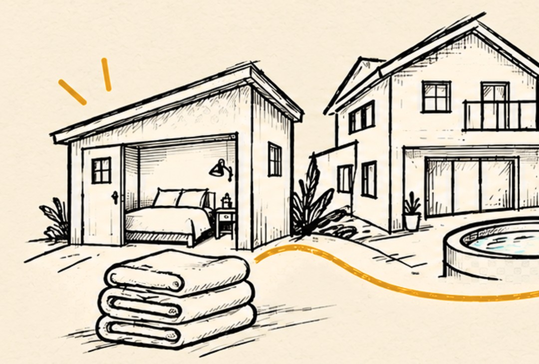 A pencil sketch of a small studio beside a larger two-story rental with a hot tub and a stack of folded towels.